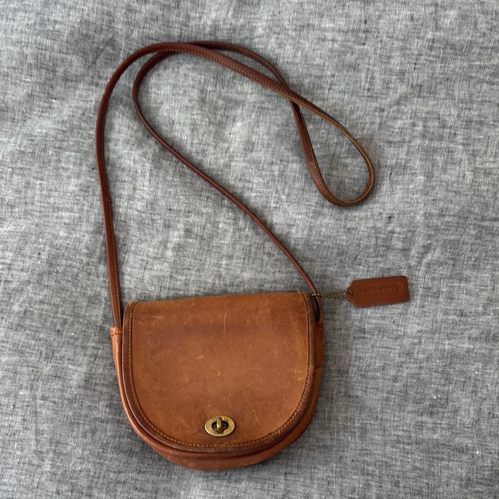 Vintage Coach Brown Leather Saddle Crossbody Bag with Turnlock Closure